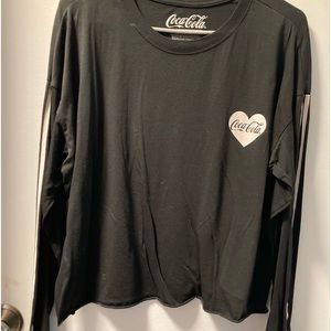 Cute long sleeve top that has Coca Cola design!